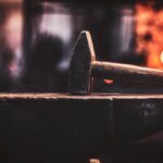 Traditional blacksmith forge with fire representing the Spire Forge artisan web studio process.